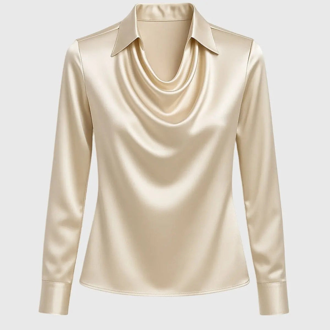 Champagne satin blouse laid flat, showing draped cowl neck and pointed collar detail