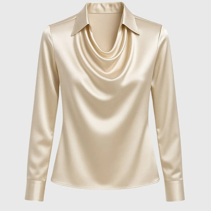 Champagne satin blouse laid flat, showing draped cowl neck and pointed collar detail