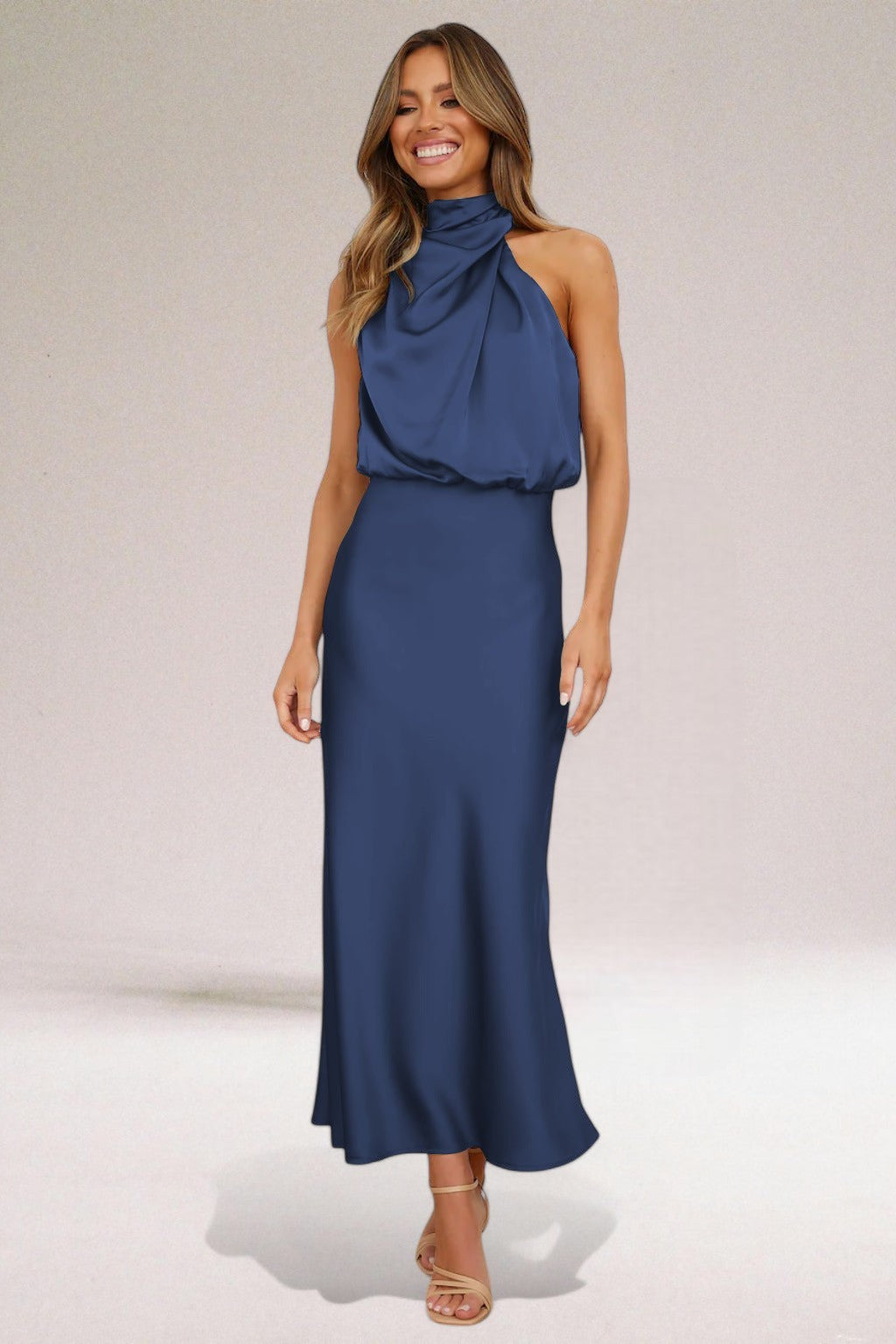 Navy satin halter neck dress with gathered blouson top and midi skirt
