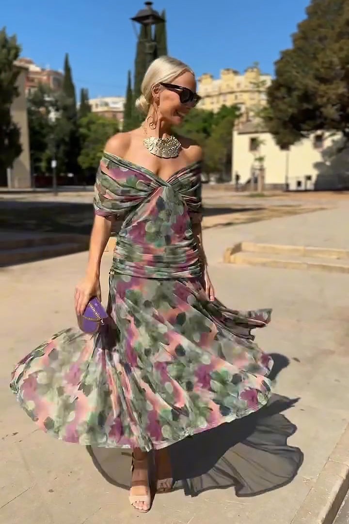 Twirling floral print maxi dress with ruched bodice and flared hem