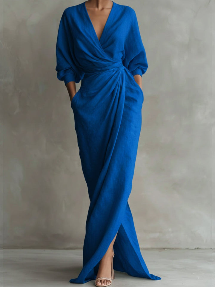 Cobalt blue wrap maxi dress featuring draped bodice and batwing sleeves