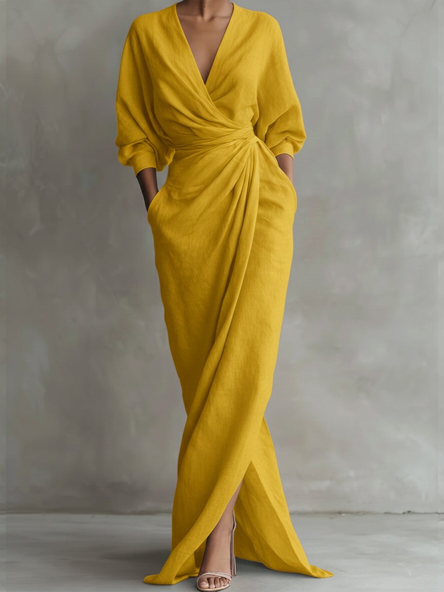 Mustard yellow wrap maxi dress featuring draped bodice and split skirt