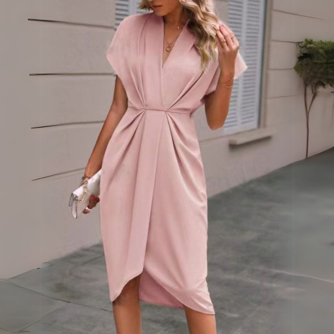 Blush pink draped midi dress featuring cap sleeves and gathered waist