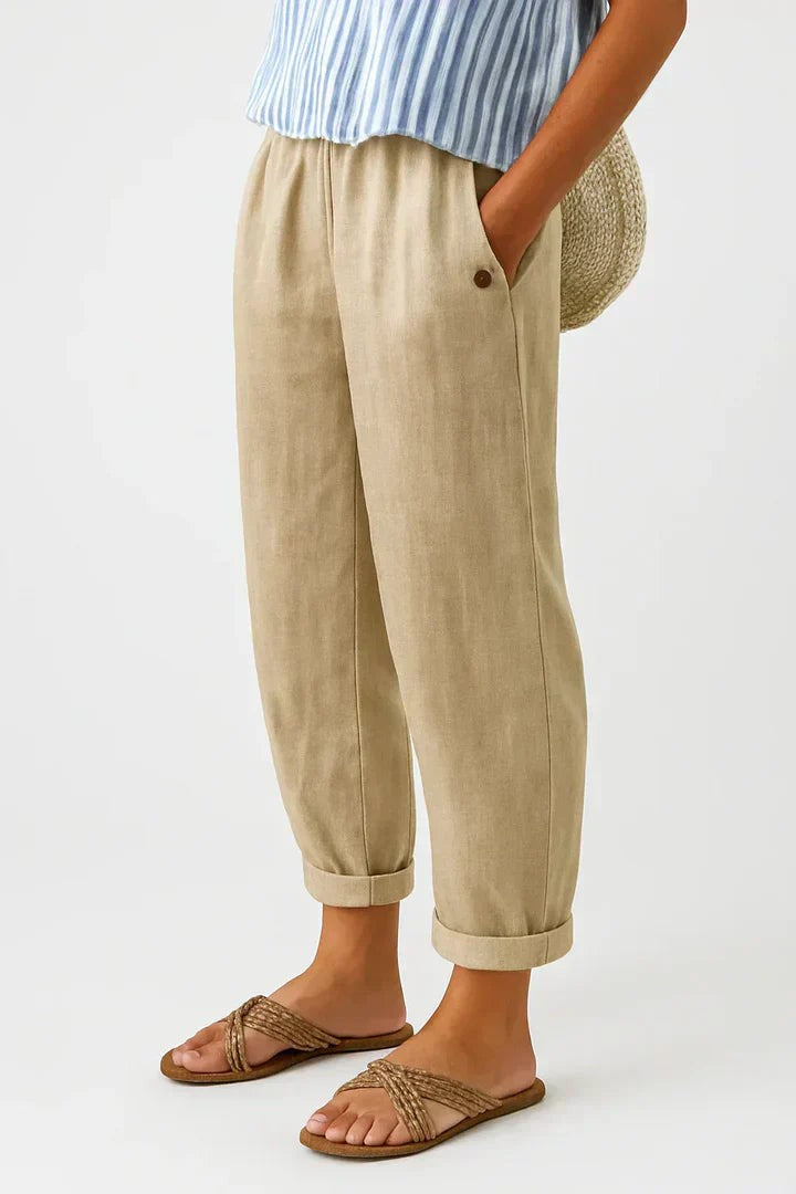 Beige linen-blend turn-up trousers with elasticated waist and button pocket detail