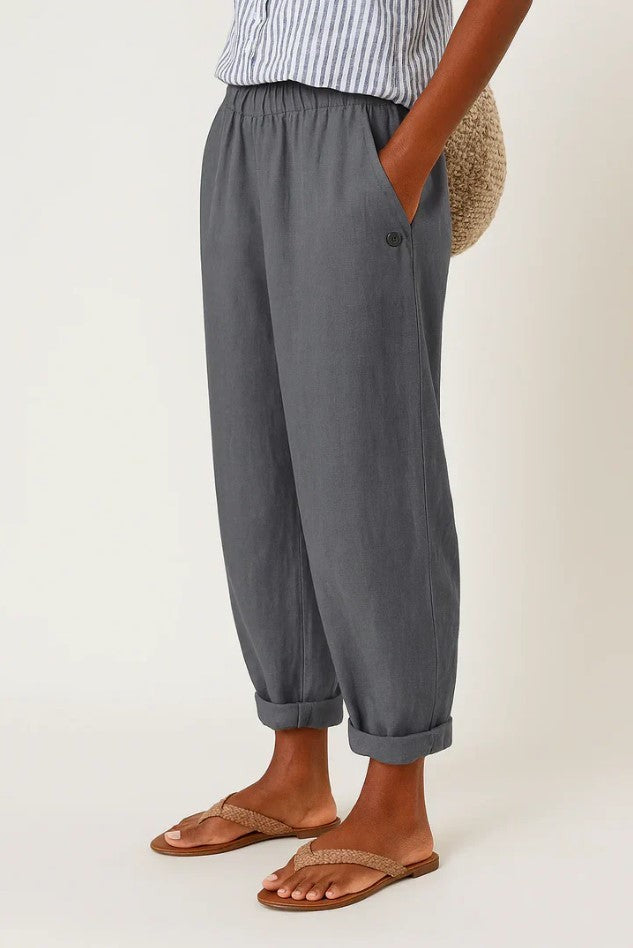 Charcoal grey turn-up trousers with elasticated waistband and button pocket trim