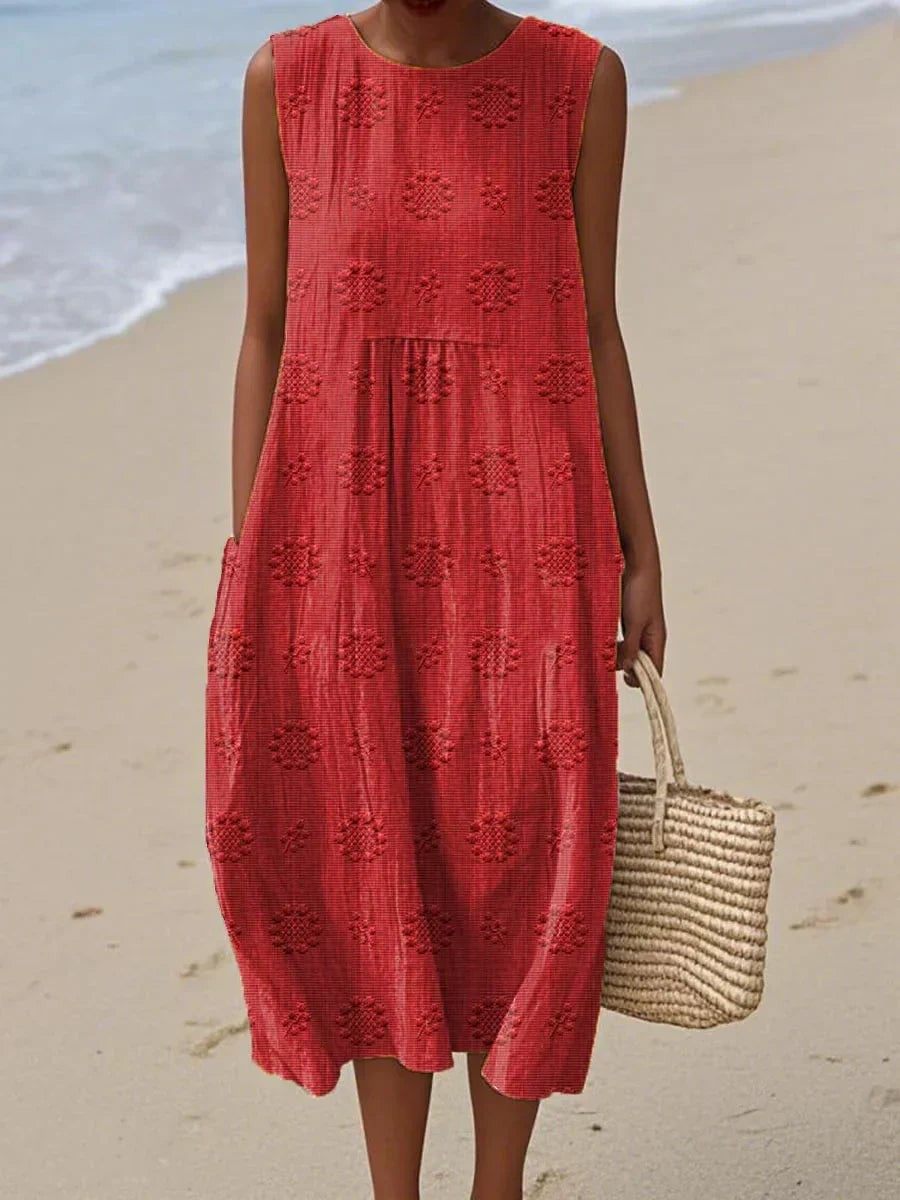 Red sleeveless midi dress with embroidered floral texture and pockets