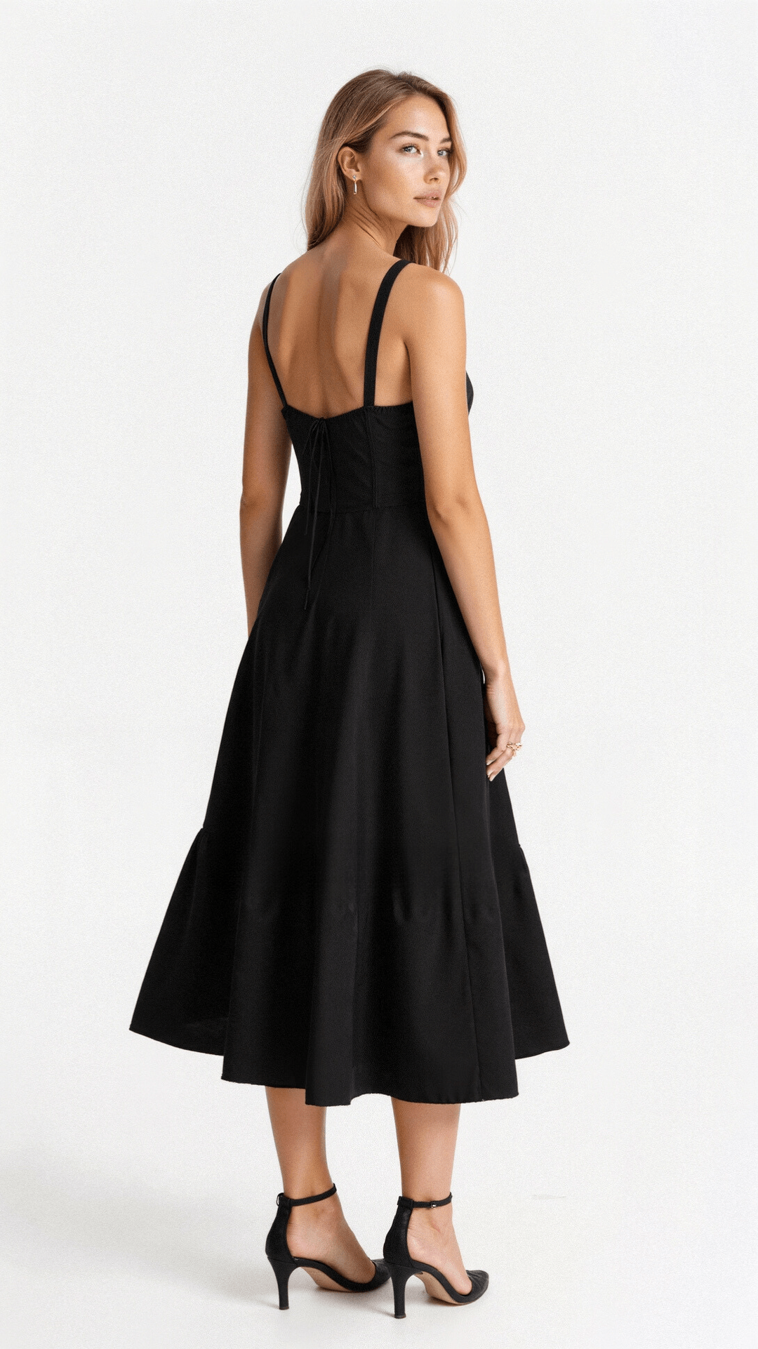 Rear view of black midi dress showing lace-up corset back detail
