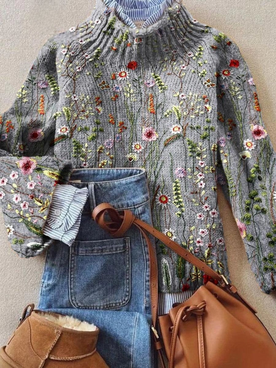 Grey floral embroidered turtleneck jumper styled with denim jeans and tan accessories
