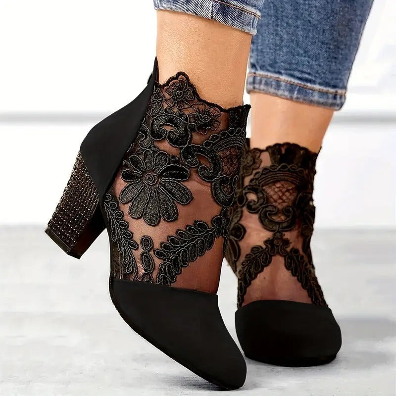 Black suede ankle boots with sheer lace overlay and chunky block heel