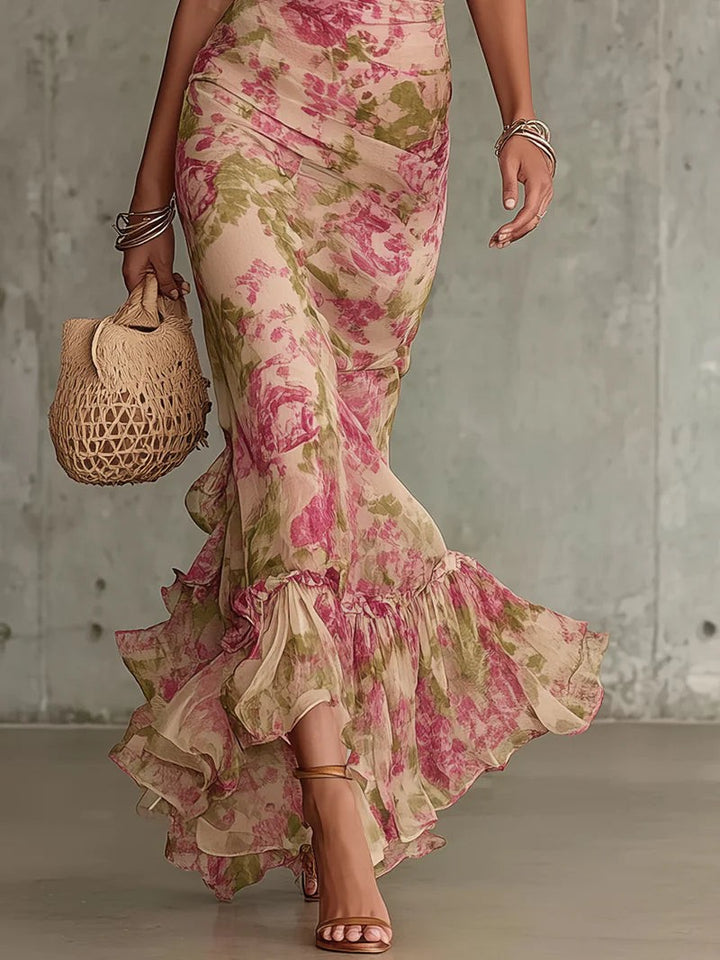 Ruffled mermaid hemline detail on floral maxi dress with tiered frills
