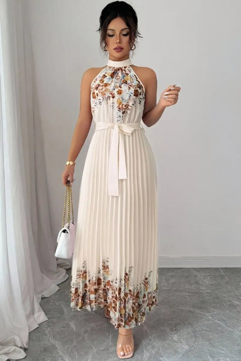 Cream pleated maxi dress with floral hem and halter neckline