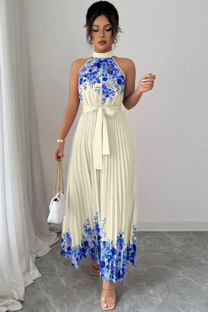 Ivory pleated maxi dress with blue floral print and halter collar