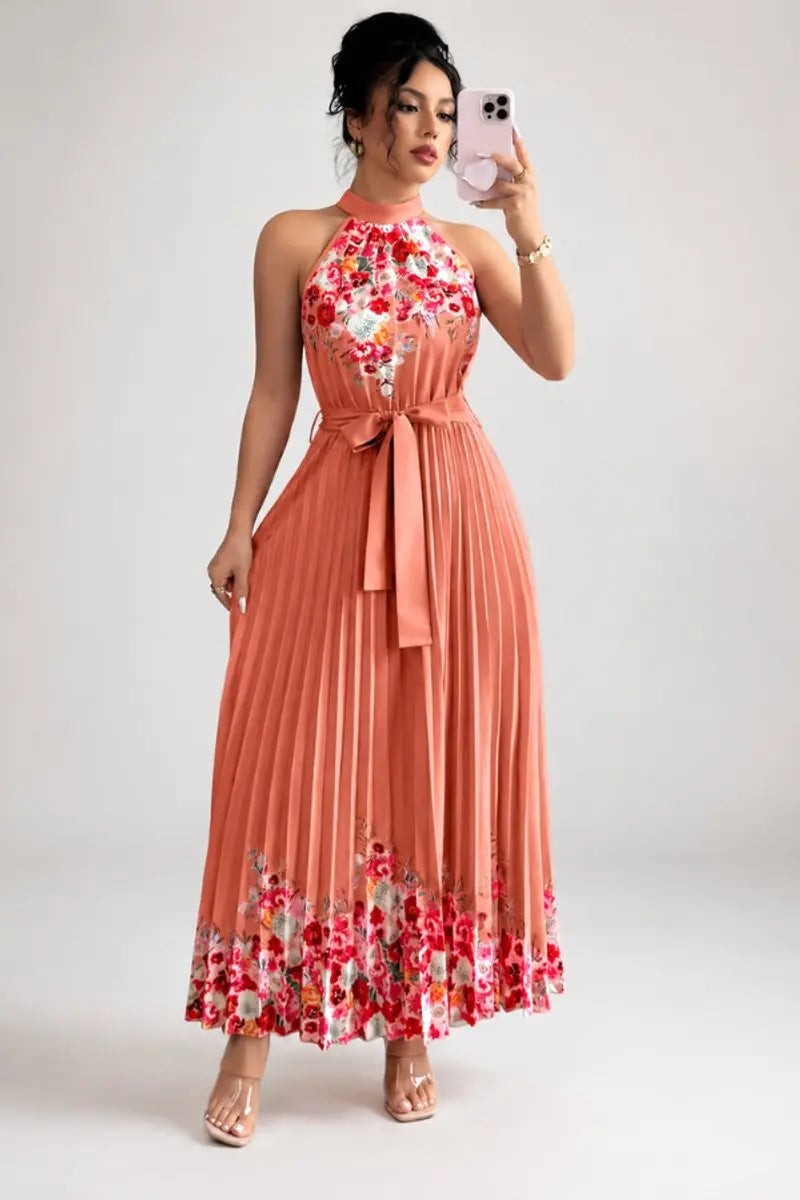 Coral pleated halter maxi dress featuring floral border trim