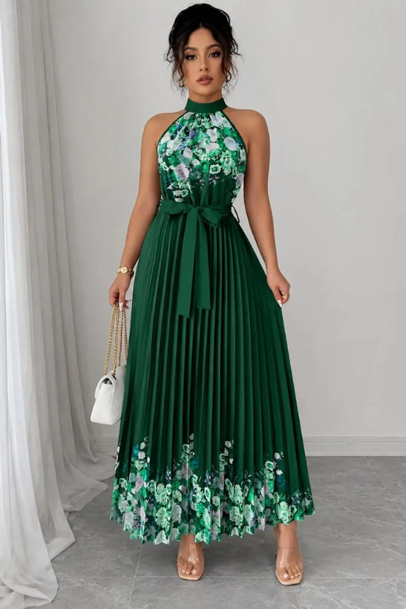 Emerald green pleated halter maxi dress with floral hem trim