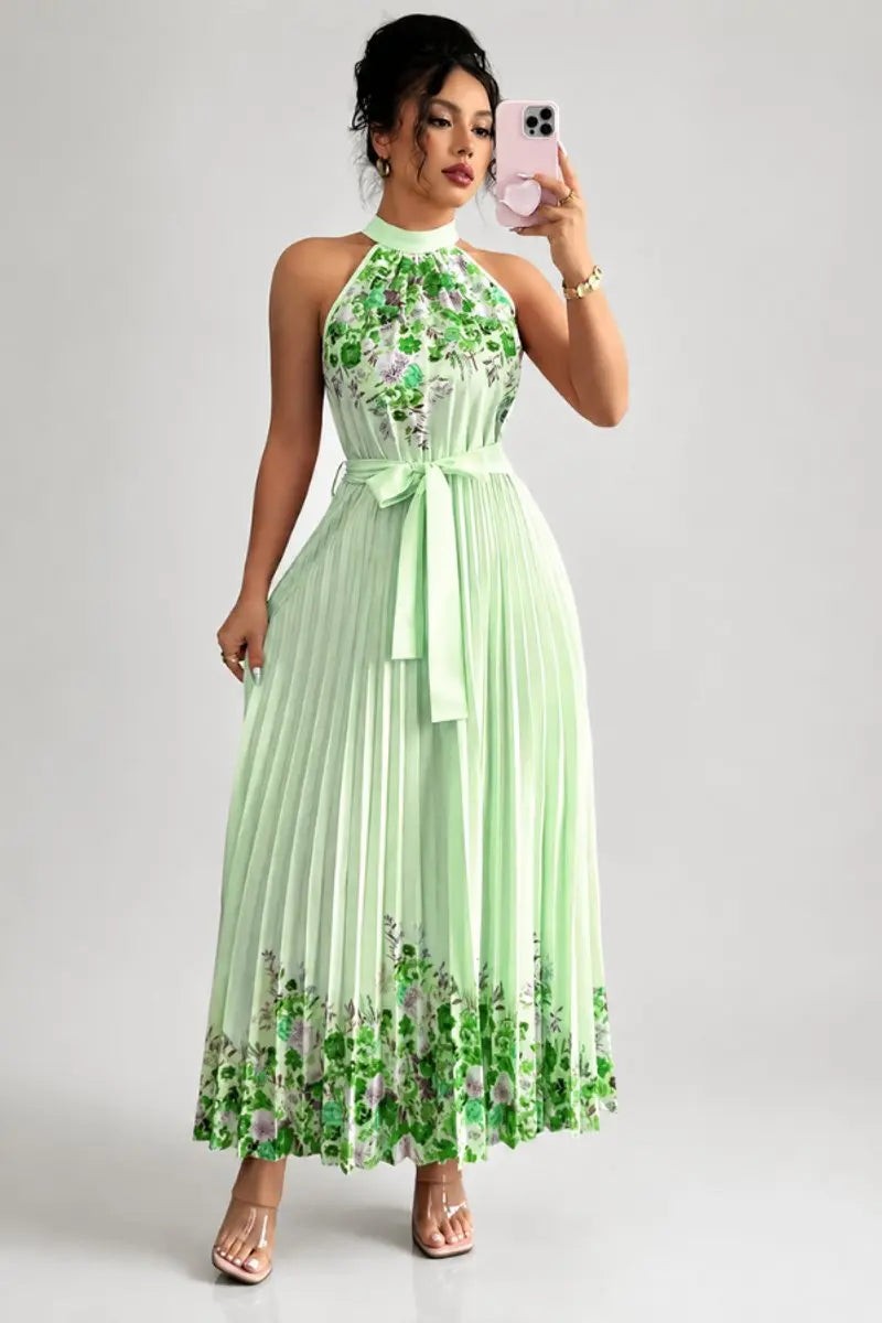 Mint green pleated halter maxi dress with floral hem detailing