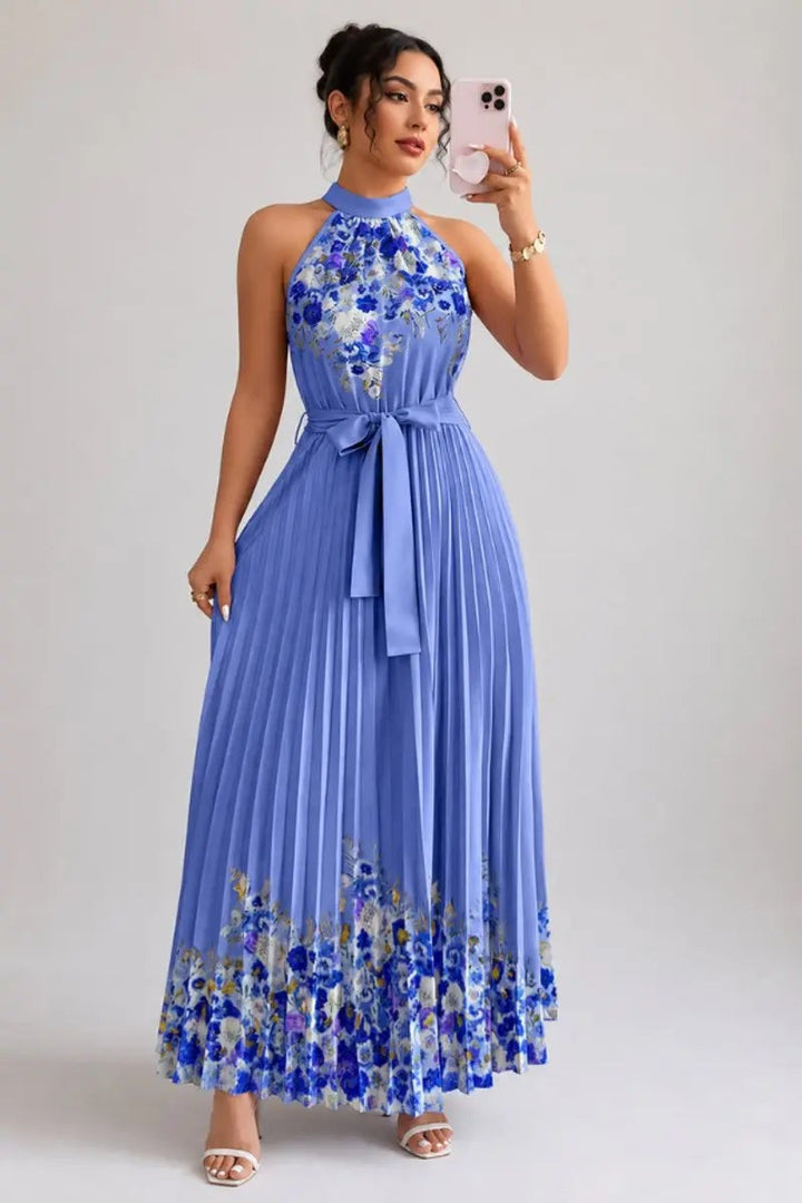 Cornflower blue pleated maxi dress with floral border and halter neck
