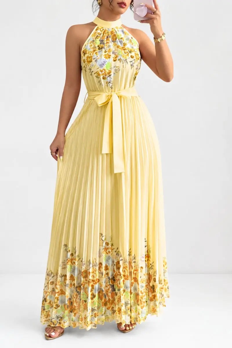 Pastel yellow pleated maxi dress with floral hem and halter collar