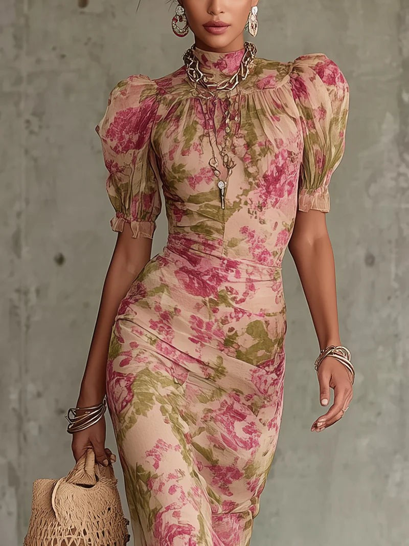 Close-up of pink floral bodice with puff sleeves and chain necklace detail