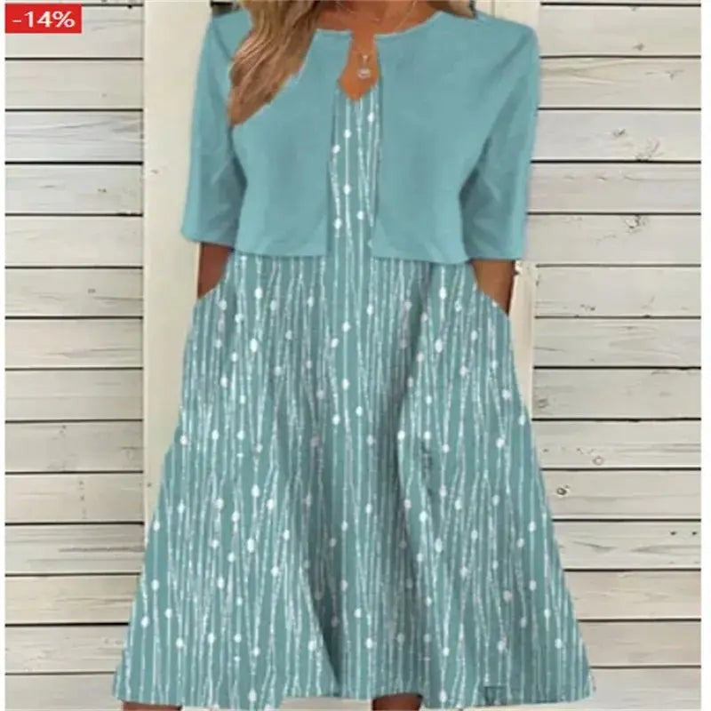 Duck-egg blue midi dress with attached bolero and delicate leaf motif