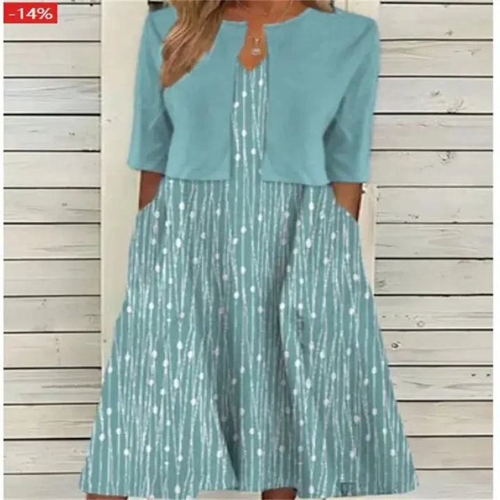 Duck-egg blue midi dress with attached bolero and delicate leaf motif