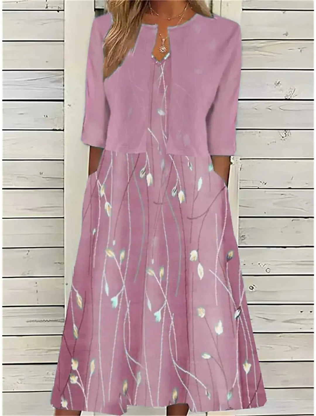 Dusky pink midi dress styled with matching cropped jacket and floral sprig print