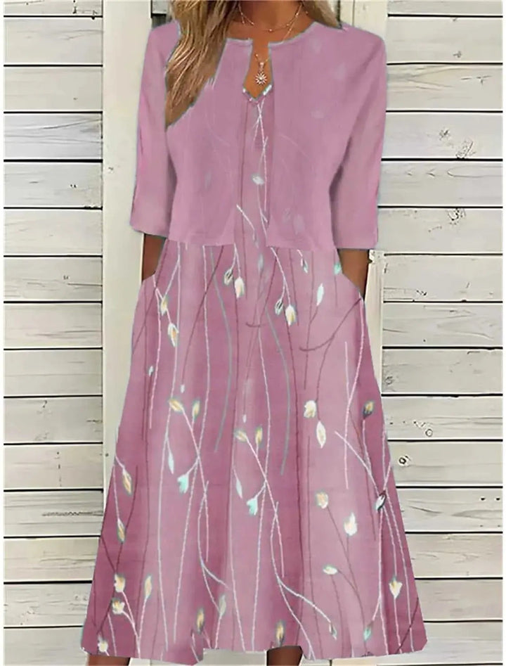 Dusky pink midi dress styled with matching cropped jacket and floral sprig print