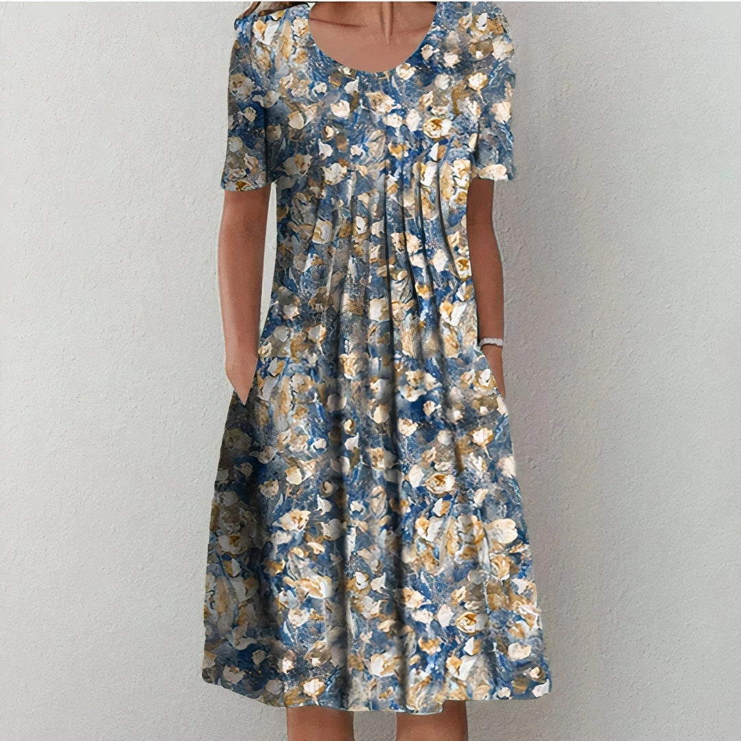 Blue midi dress with abstract gold and cream floral print design
