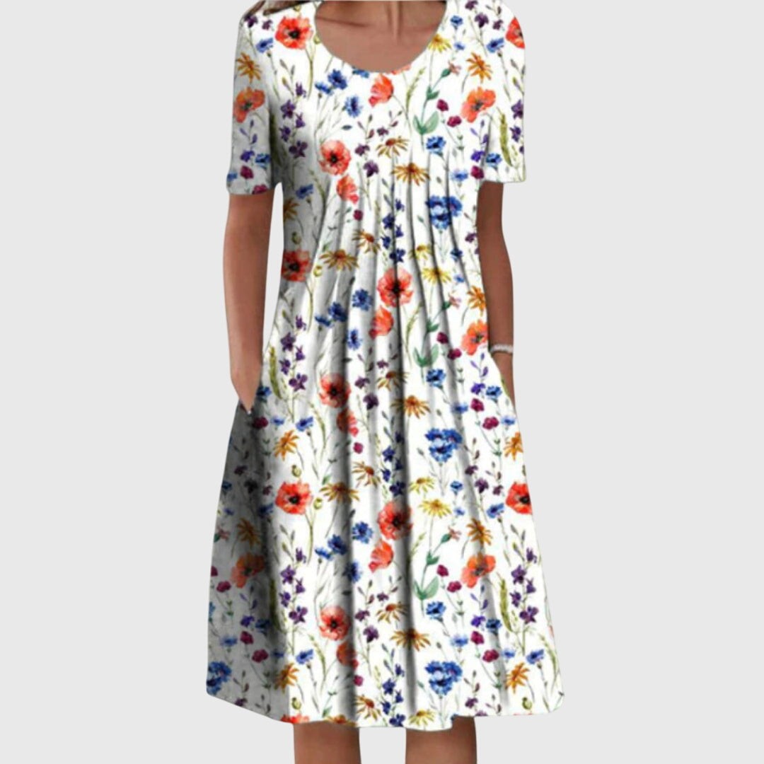 Wildflower print swing dress with round neckline and short sleeves