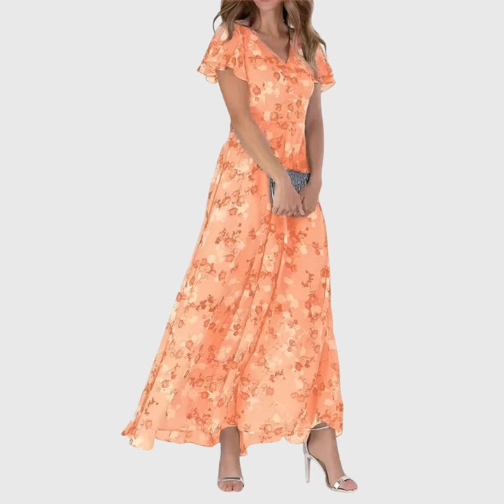 Coral floral chiffon maxi dress with flutter sleeves and V-neckline