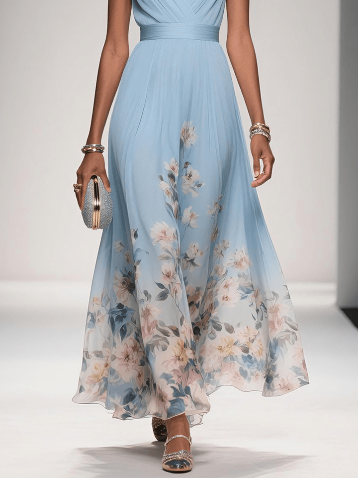 Pale blue floral print maxi skirt detail with delicate botanical hem design