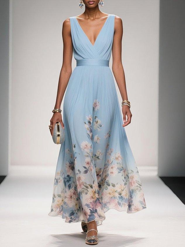 Sky blue floral print wedding guest dress with V-neckline and flowing maxi skirt