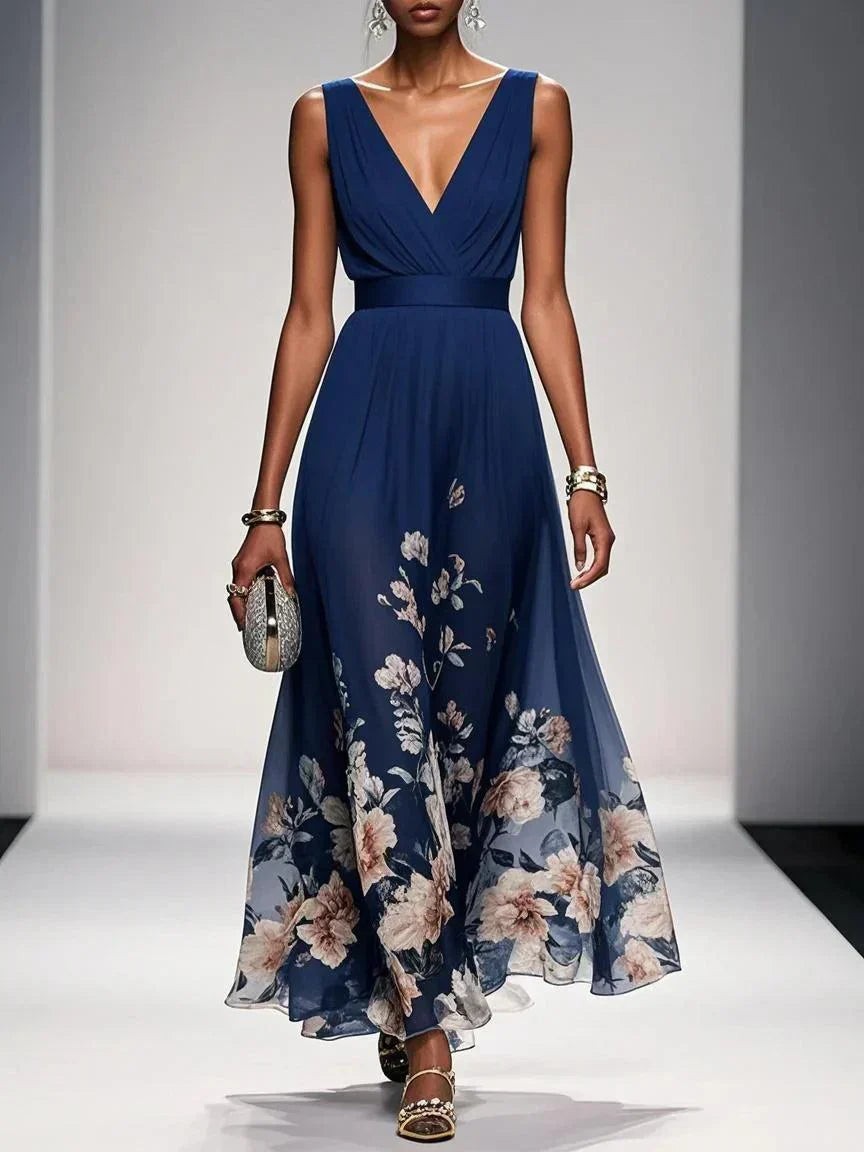 Navy floral hem maxi dress featuring a draped V-neckline and cinched waist