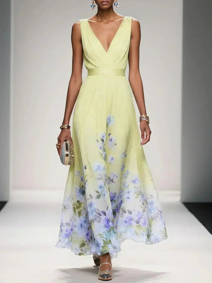 Pastel yellow floral print maxi dress with sleeveless pleated bodice