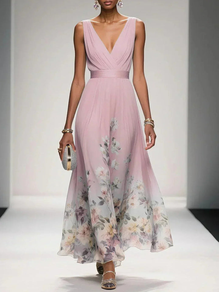 Dusty pink floral print maxi dress with sleeveless V-neckline and belted waist