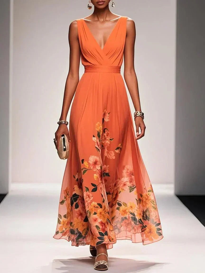 Burnt orange floral print maxi dress with pleated V-neck and flowing hemline