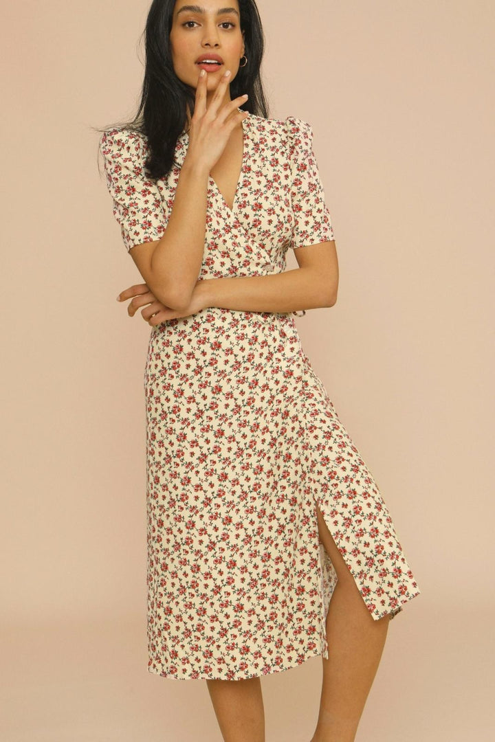 Ditsy rose print midi dress featuring a side slit and V-neckline