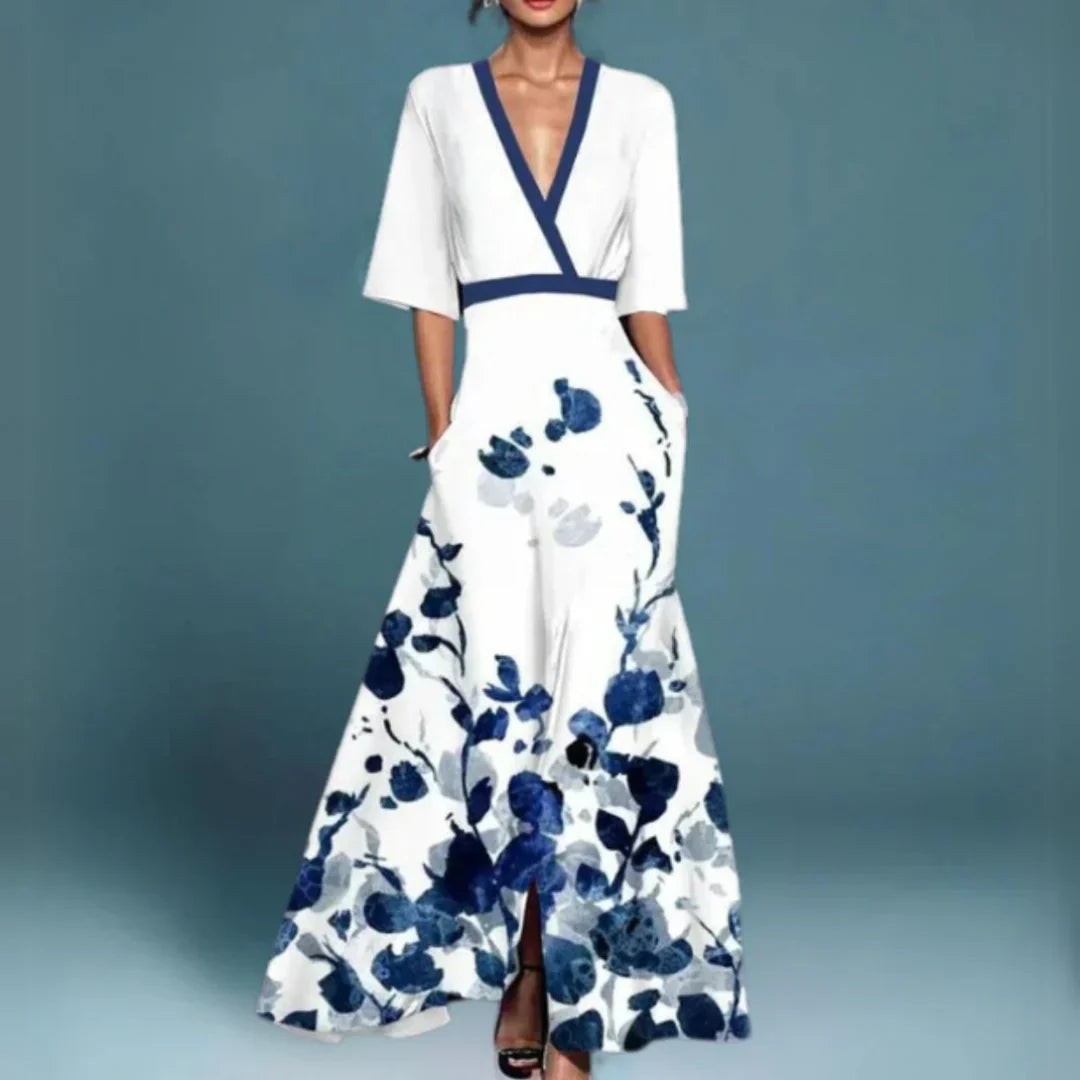 White maxi dress with navy floral print and contrast V-neck trim