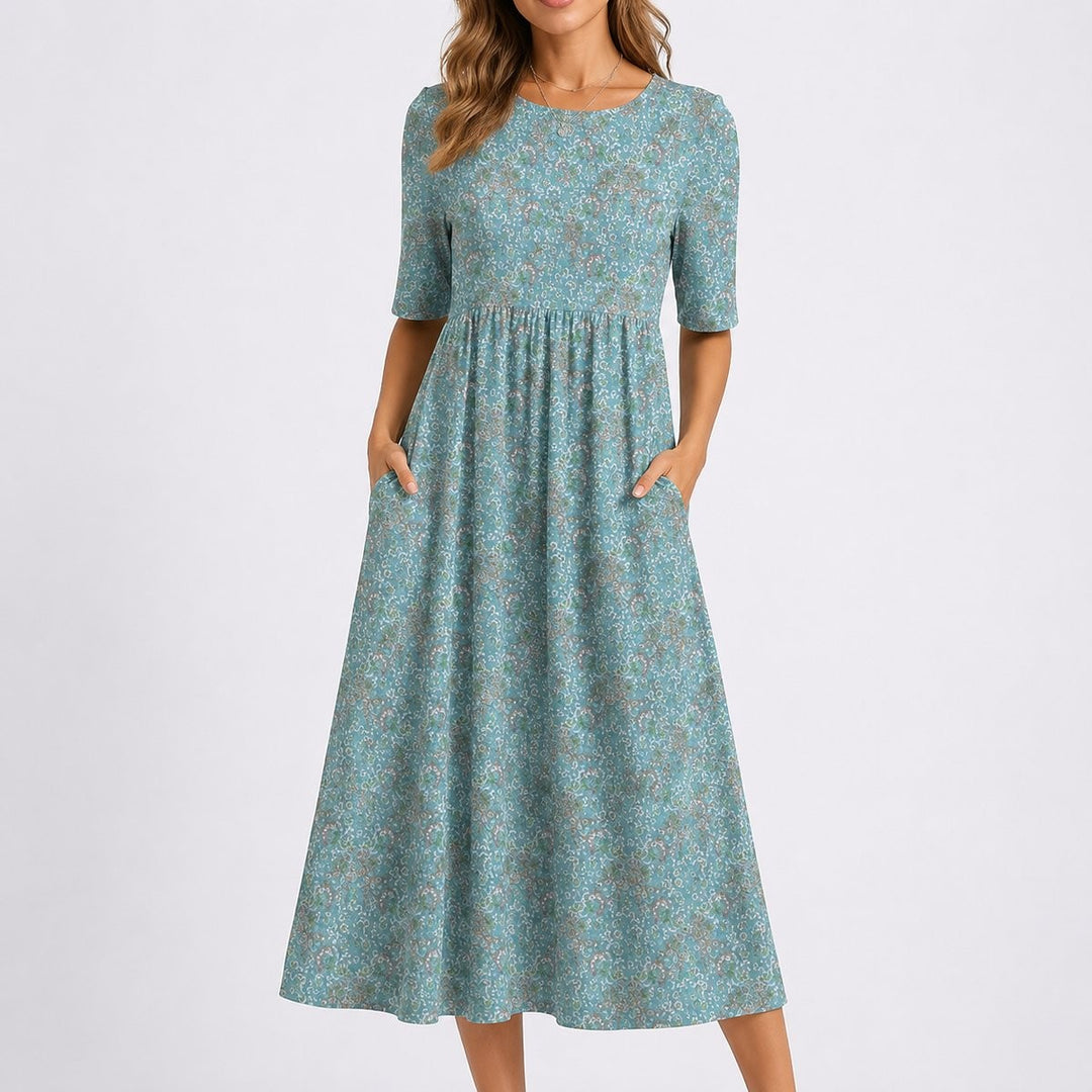 Duck-egg blue floral midi dress with short sleeves and side pockets