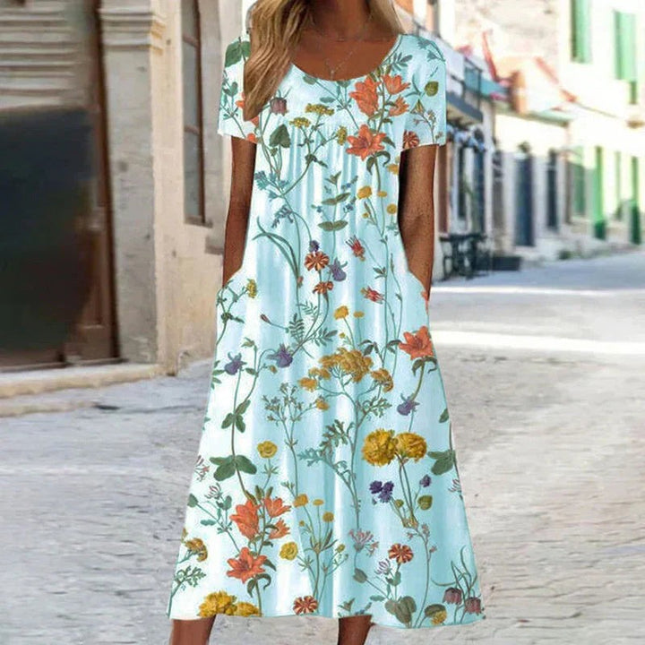 Duck-egg blue floral maxi dress with short sleeves and side pockets