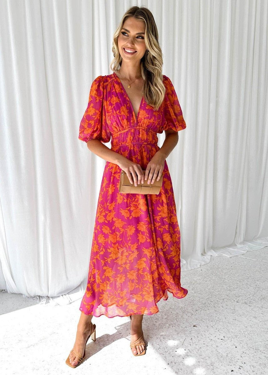 Pink and orange floral midi dress with puff sleeves and plunging V-neck