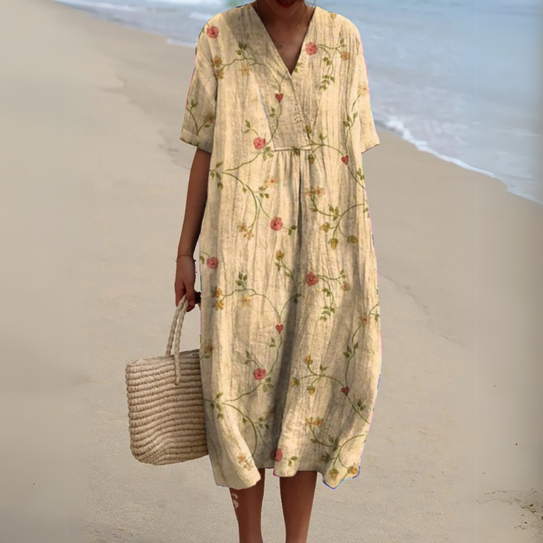 Cream floral vine print V-neck dress with loose midi silhouette