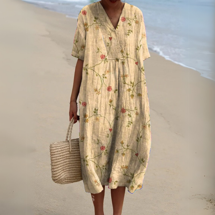 Cream floral vine print V-neck dress with loose midi silhouette