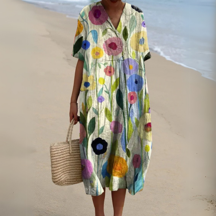 Ivory midi dress adorned with colourful abstract floral pattern