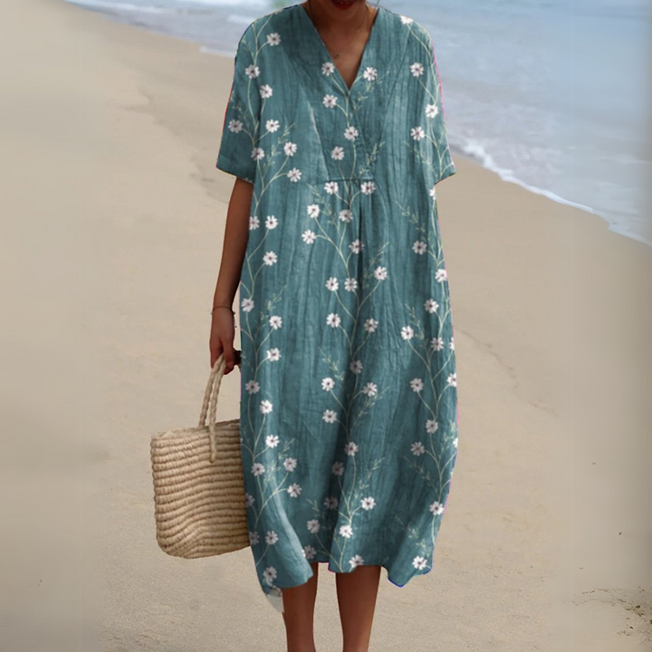 Teal daisy print V-neck midi dress with relaxed short sleeves