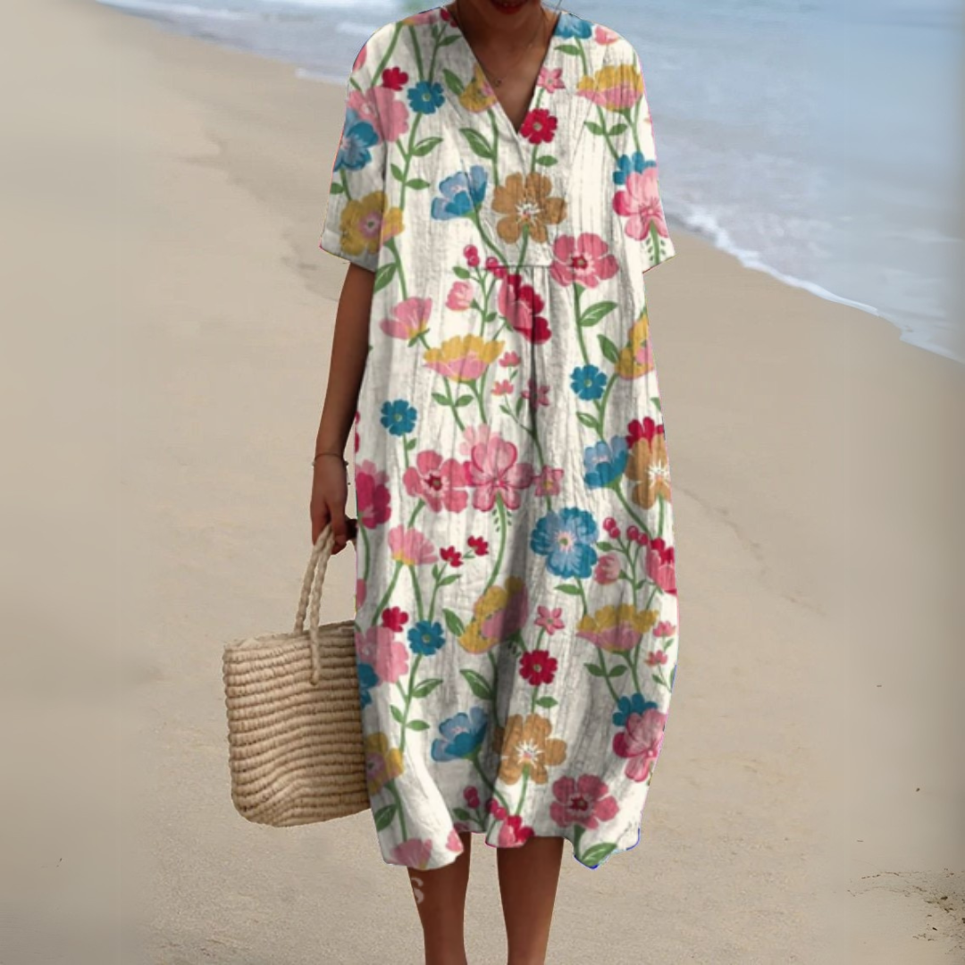 White floral print midi dress featuring pink and blue blooms