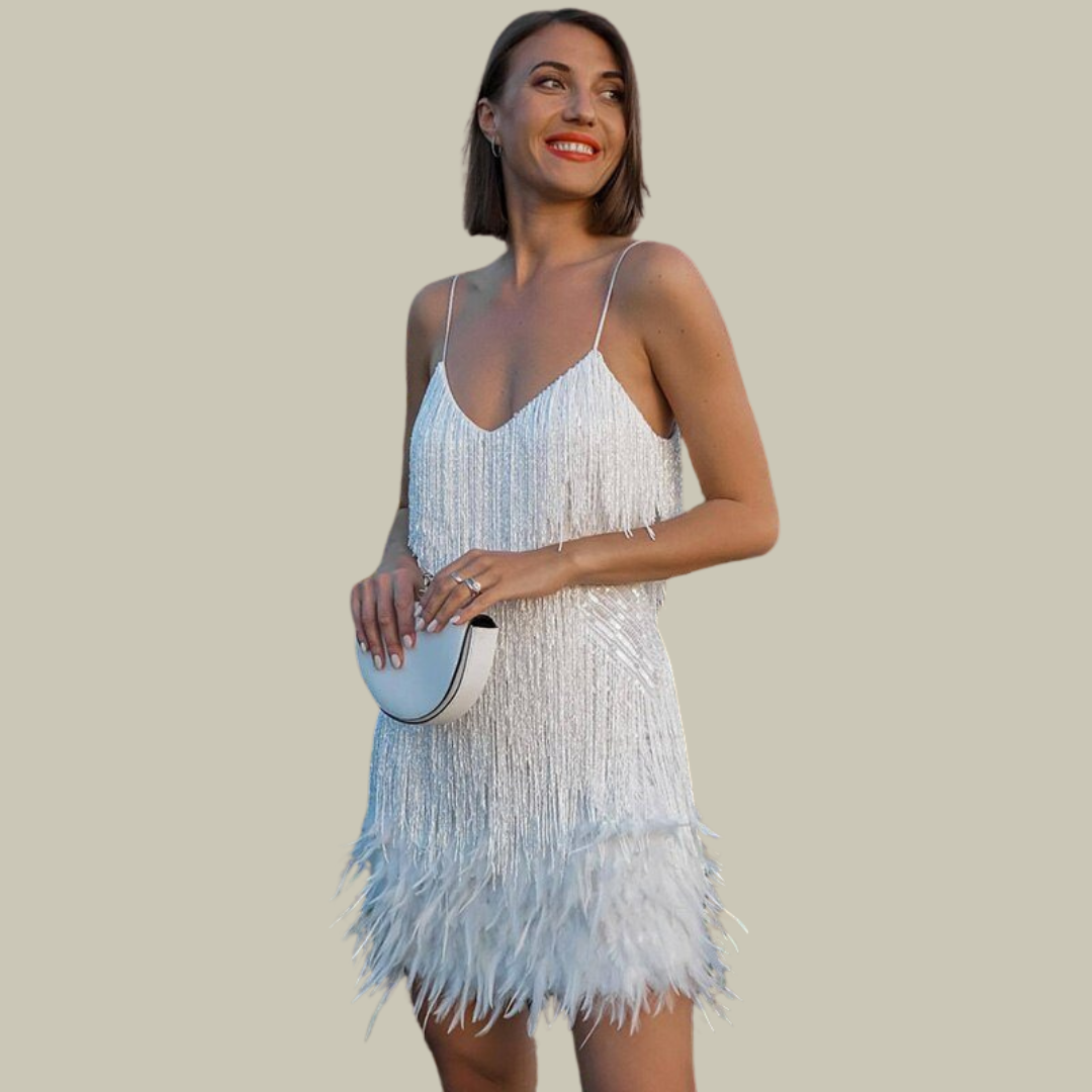 White fringe mini dress with feather hem and delicate spaghetti straps
