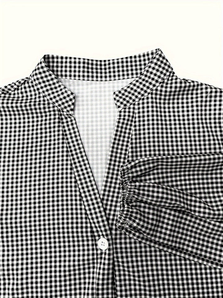 Close-up of black and white gingham collar and button placket detail