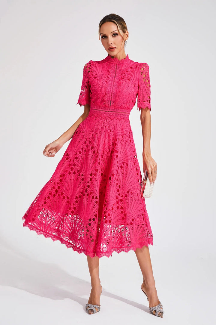 Fuchsia lace midi dress featuring puff sleeves and fitted waist