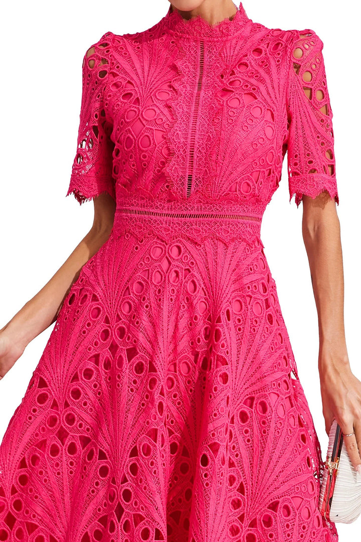 Close-up of fuchsia lace midi dress bodice with fan-shaped cutwork detail