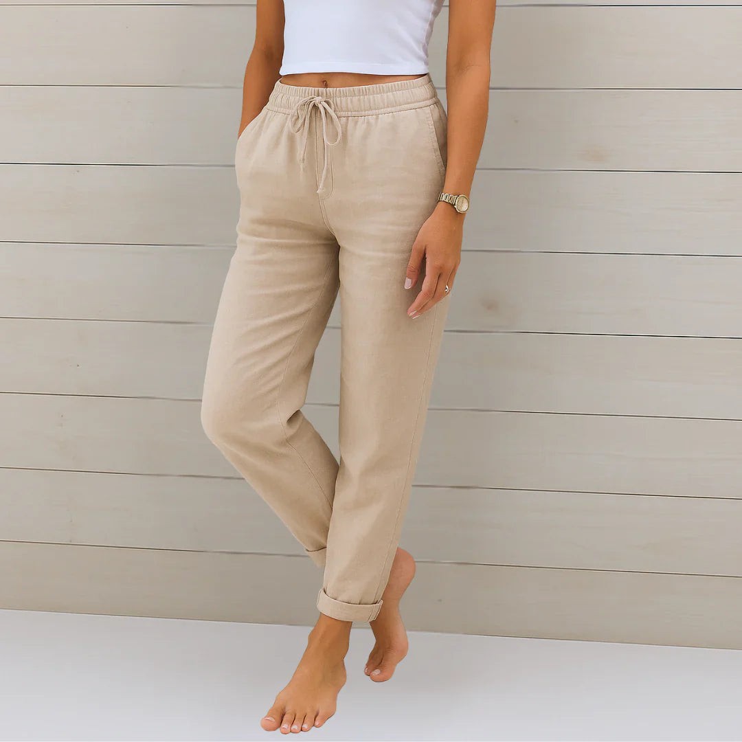 Beige linen-blend trousers with drawstring waist and turned-up cuffs